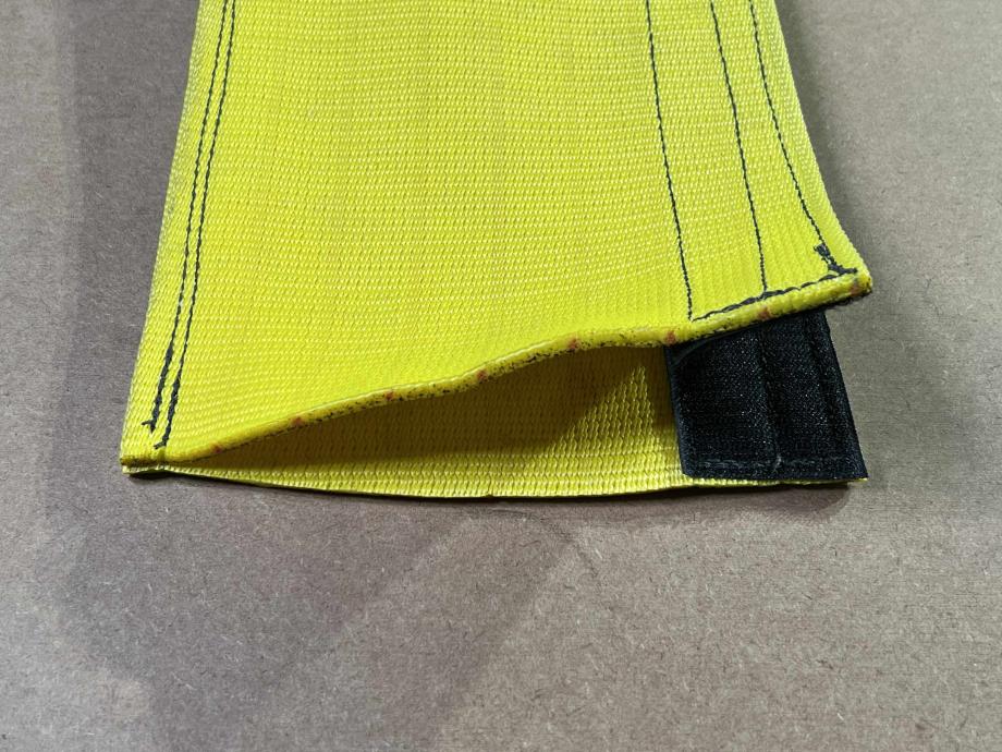 Top and bottom of wear pads are sewn together on one side with hook and loop on the other side so the wear pad can be attached and taken off at any time